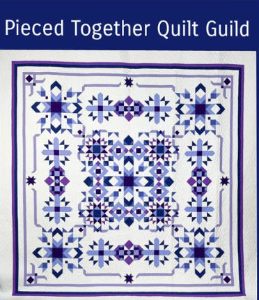 beautiful purple pieced together quilt